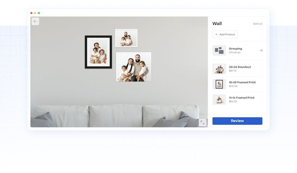 Screenshot with three family portraits in various Wall Art products arranged in Gallery Wall Designer in browser window over light blue grid pattern background