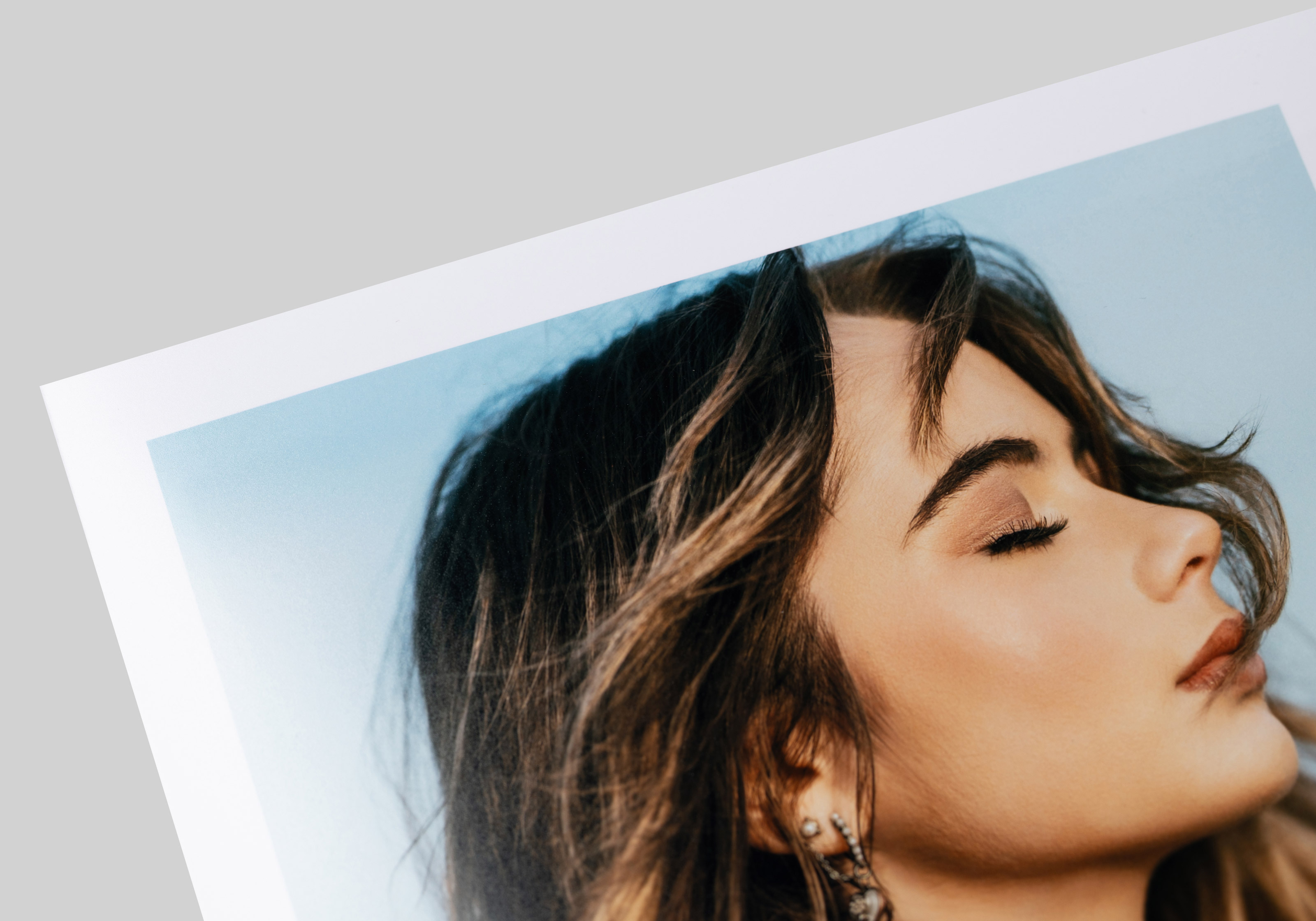 Close-up of a portrait printed on Photo Matte paper, showcasing a satin sheen, minimal surface texture, a wide tonal range, and detailed highlights.