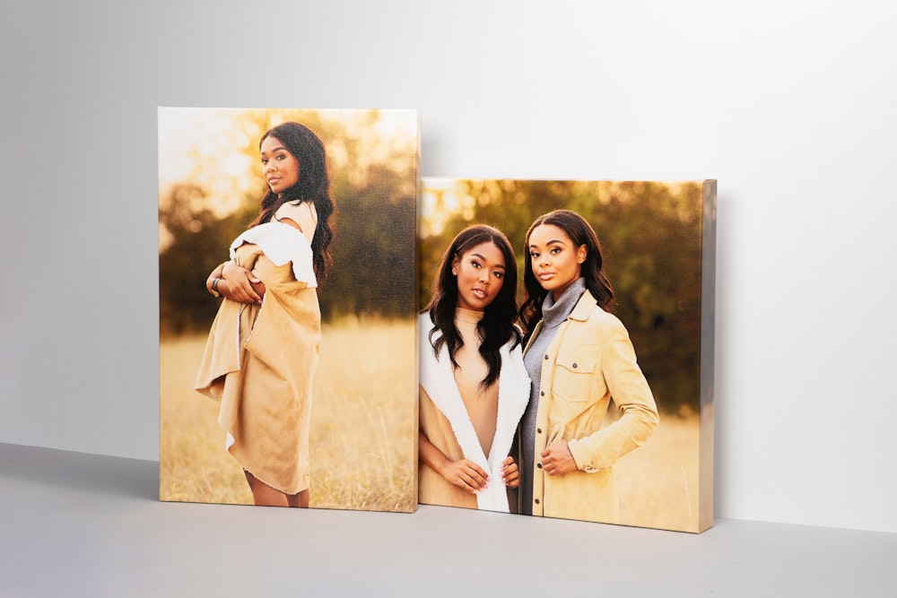 1½" and 2½" depth Premium Gallery Wraps standing up on light gray background, featuring senior portrait photography