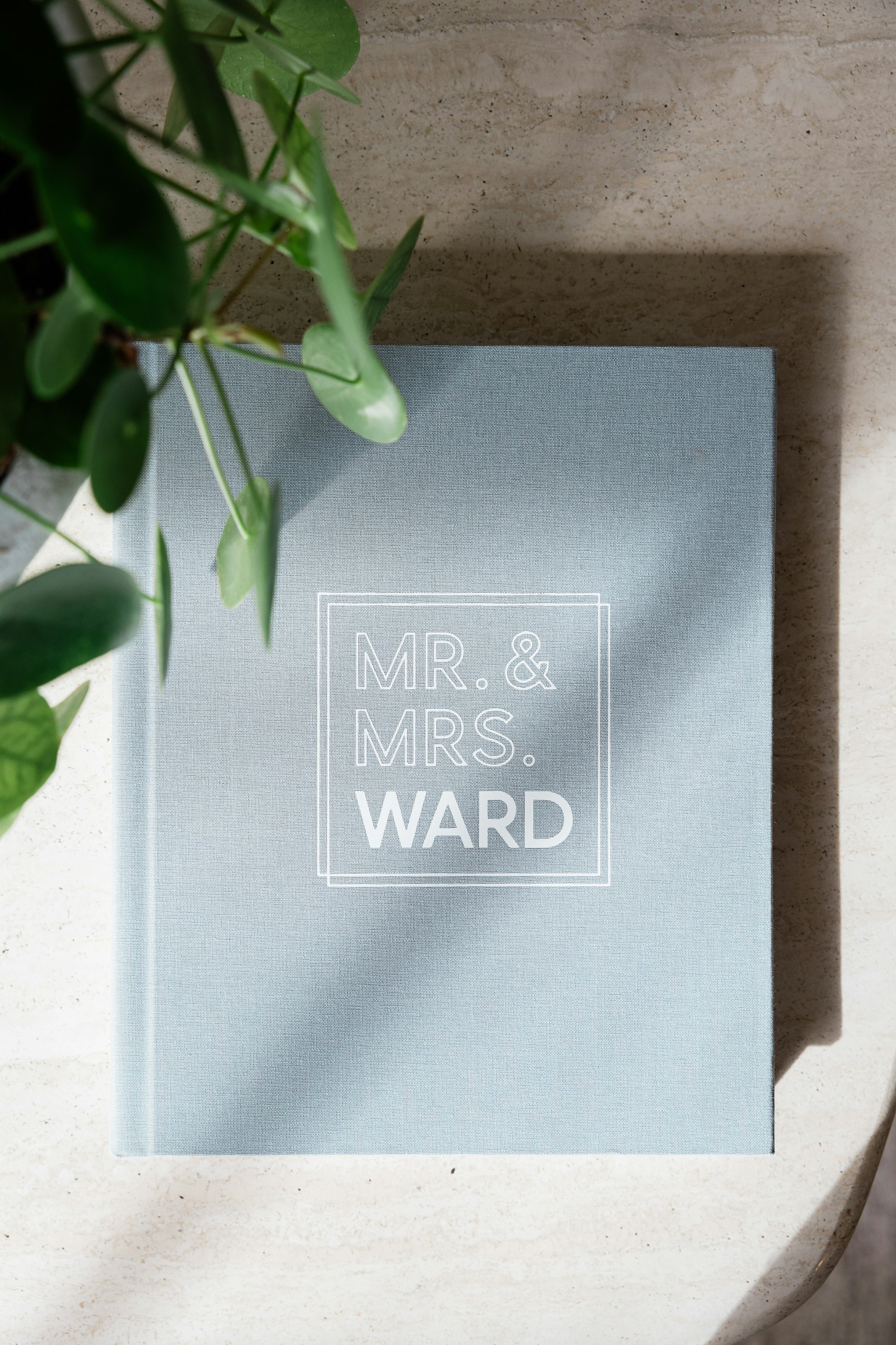 A WHCC Wedding Photo Album featuring album design for photographers with custom debossing.