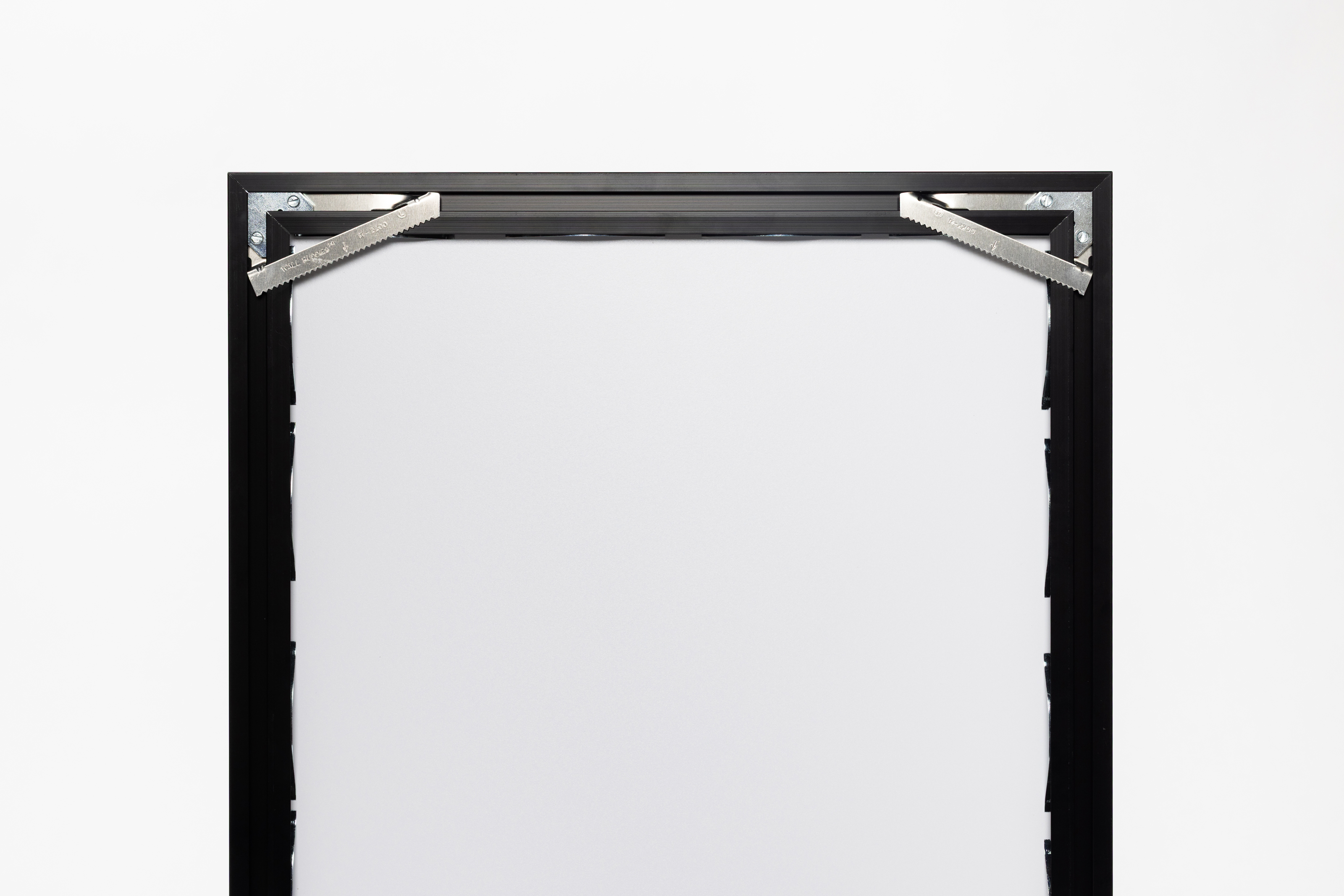 Back of metal moulding Framed Print with Corner Brackets on white background