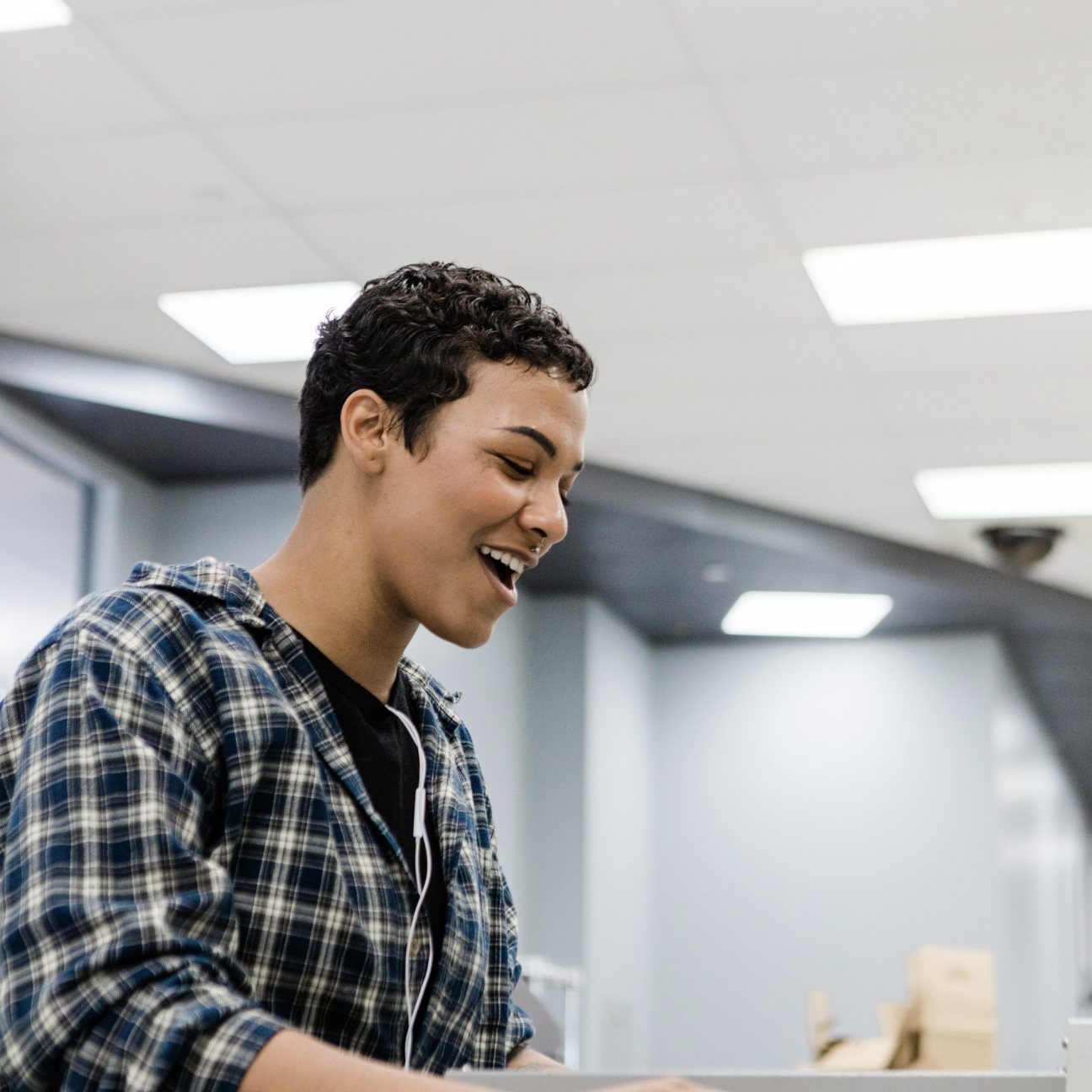 WHCC employee working in the production lab