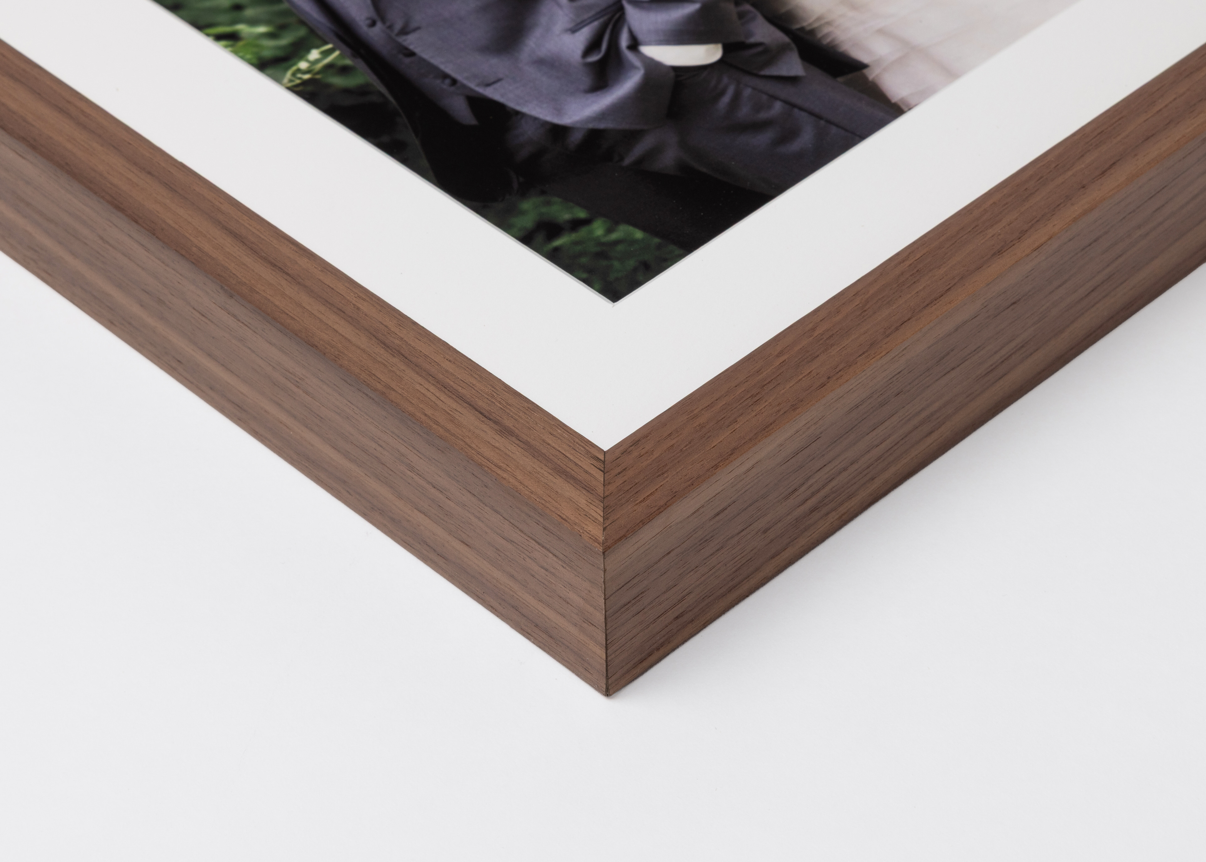 Corner detail of walnut Woodland Frame moulding in ¾" width