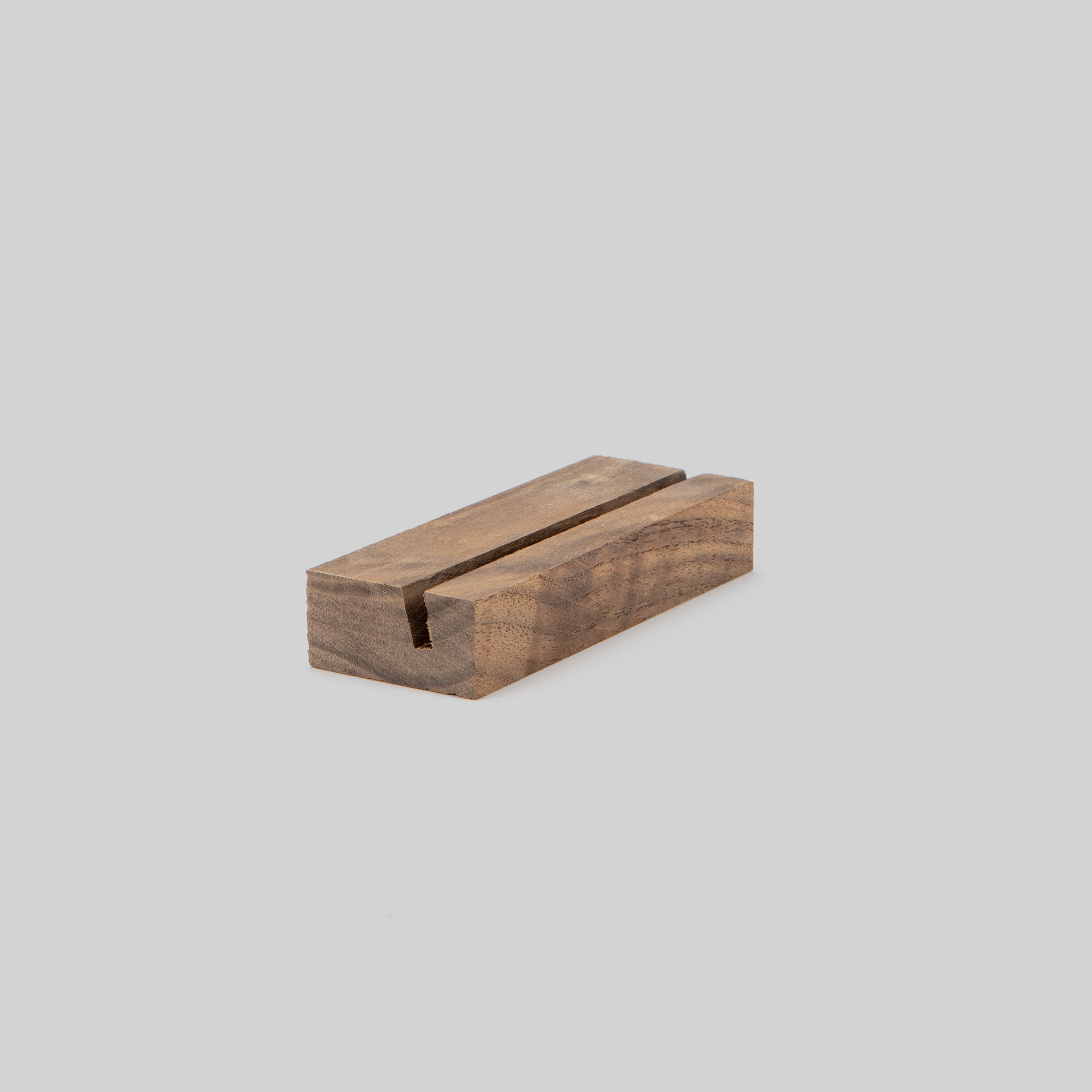 4-inch walnut Wood Display Stand at an angle on grey background